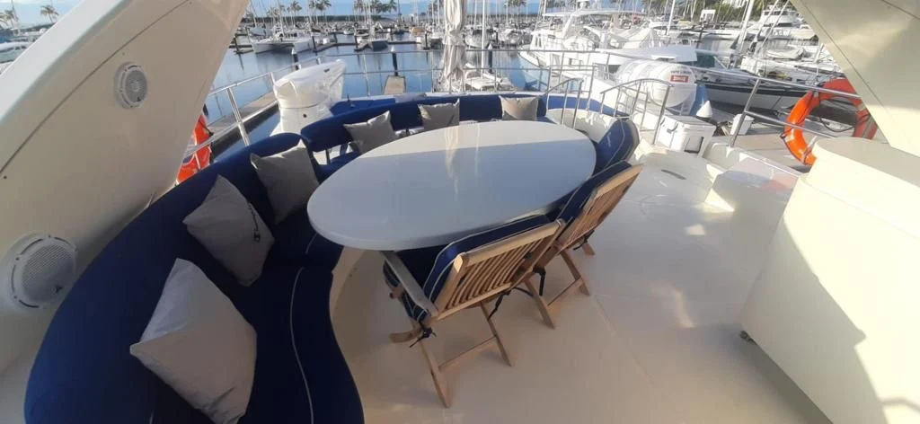 Open-air yacht dining table overlooking the marina