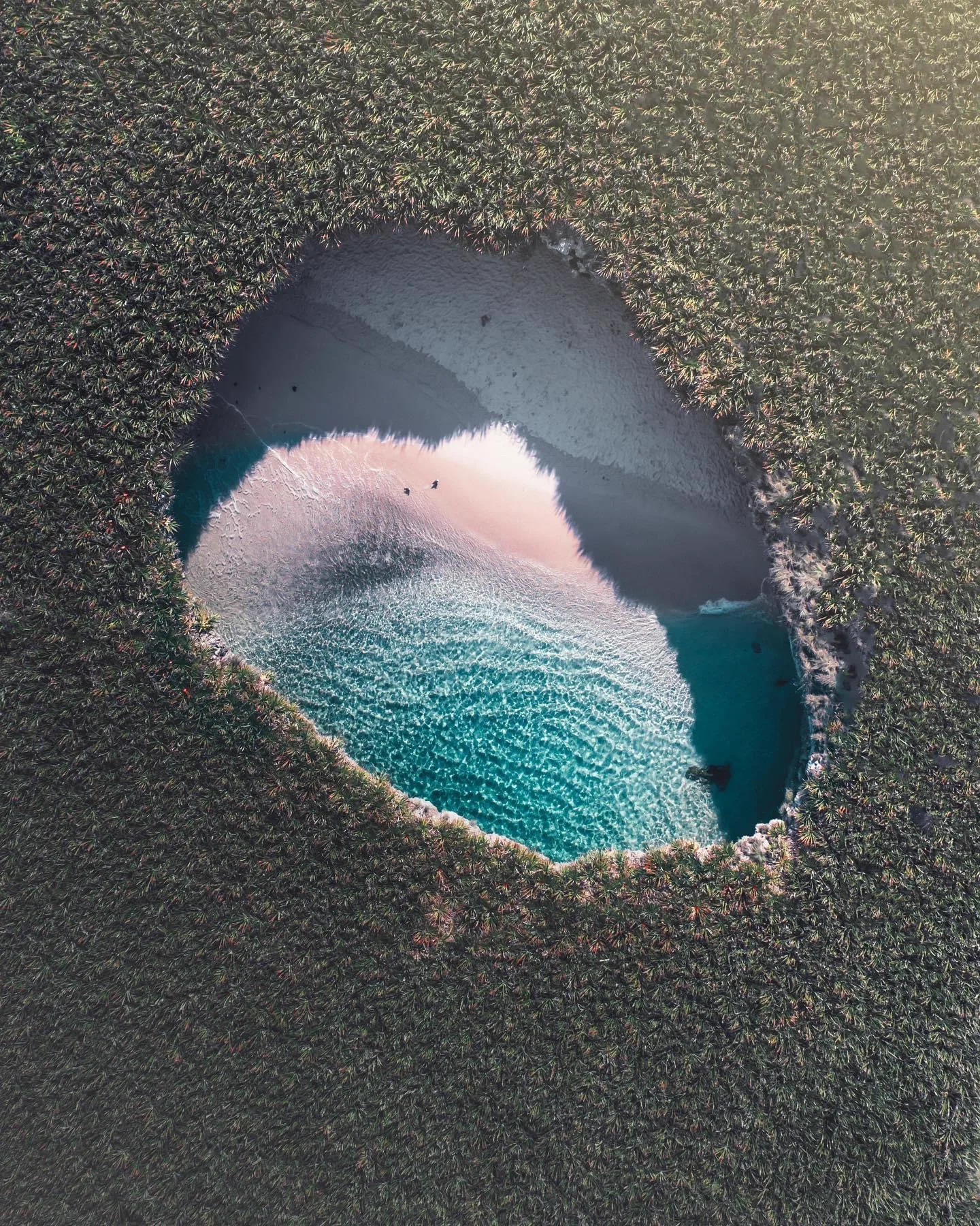 Aerial view of Hidden Beach and its volcanic island cove in the Marietas Islands